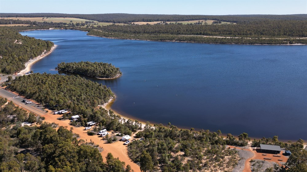 Explore the natural beauty of Kepwari Lake: Your haven for peaceful camping and outdoor adventures.